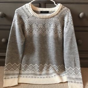 Grey and cream colored printed sweater